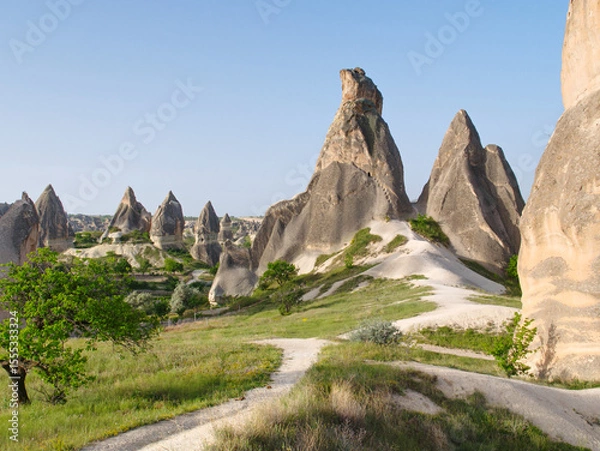 Obraz Rock formations in Cappadocia, Turkey under a clear blue sky.