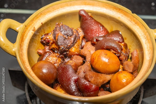 Obraz angle view pot of pork knuckles and ginger stew with eggs