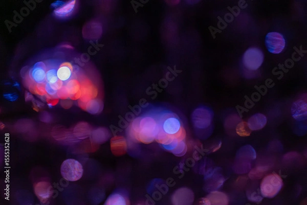 Fototapeta Abstract colorful purple bokeh background at night