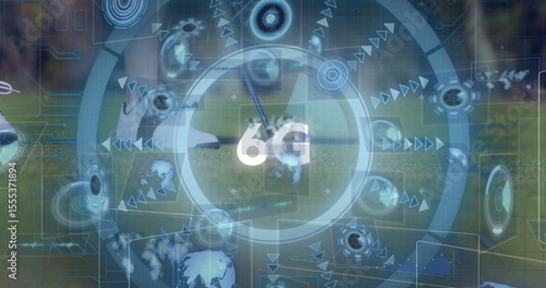 Obraz Showing futuristic 6G interface over grass field with concentric rings, globe icons and sports ball