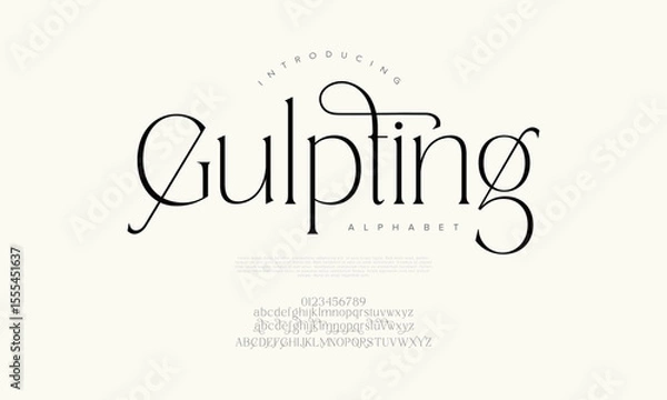 Fototapeta Thin serif font with artistic loops and calligraphic accents, perfect for upscale editorial and brand design