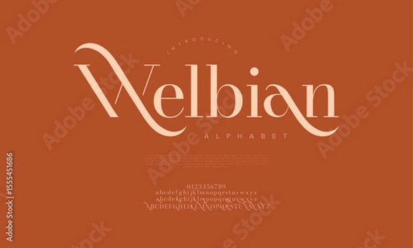 Fototapeta Decorative serif font with long elegant swashes, designed for modern luxury and branding