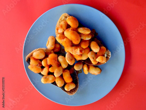 Obraz Greek gigantes beans on toast sourdough bread.