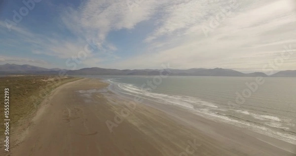 Obraz Sea shore against cloudy sky