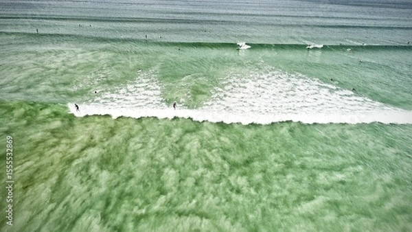 Obraz Blue ocean, Surfers on the wave, Areal view