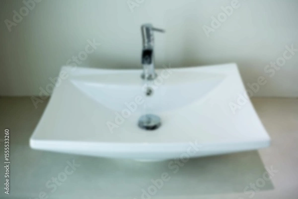Fototapeta Water running from faucet in wash basin