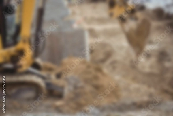 Obraz Bulldozer moving heap of mud at construction site
