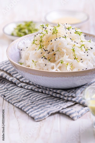 Obraz Daikon radish salad with cress and mustard and honey dressing