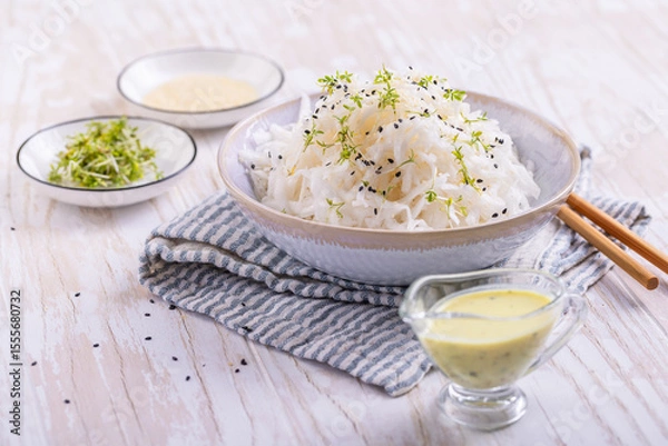Obraz Daikon radish salad with cress and mustard and honey dressing