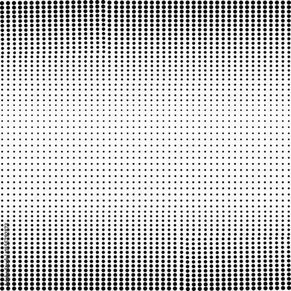 Fototapeta Halftone. Black dots on a white background. A pattern of round black dots of different sizes. Design element.