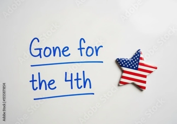Fototapeta Gone for the 4th of July Text on an Office Whiteboard a US Independence Day Business Notice with Copy Space