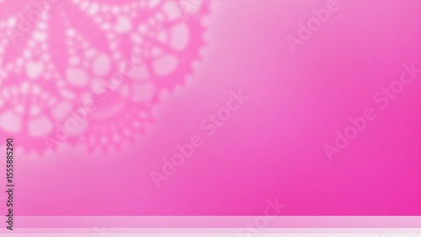 Fototapeta ピンクの壁面に、白い光をまとったピンクのレースの影が浮かぶ。