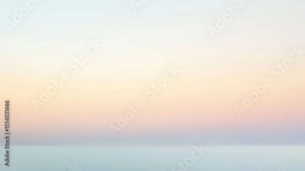 Fototapeta A soft pastel colored gradient from light blue to light yellow with a subtle horizon line view