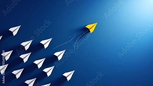 Fototapeta Bold yellow paper airplane leads a group of white planes, symbolizing leadership, innovation, and standing out on a blue background.