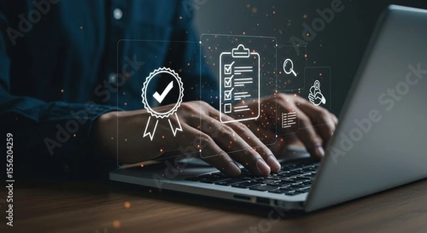 Obraz Business professional using laptop with digital quality assurance and compliance icons