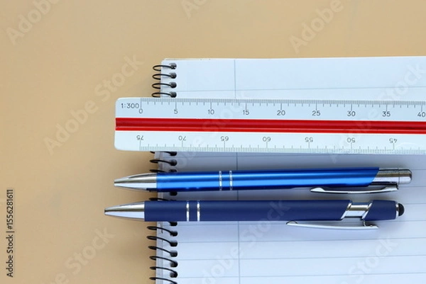 Fototapeta Office supply. Ready for school or work. Pen, paper and ruler. Take notes.