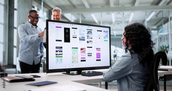 Fototapeta Diverse Team Of UI Designers Collaborating