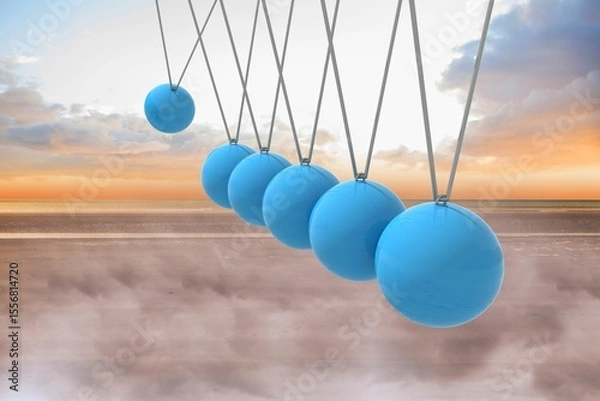 Obraz Newtons cradle above beach
