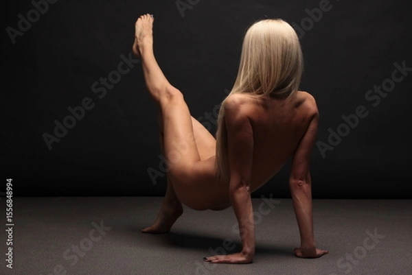 Obraz Artistic portrait of Elegant beautiful nude lady on black background	

