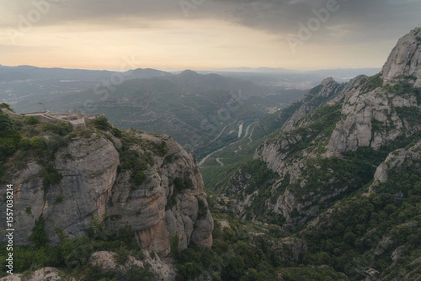 Fototapeta Montserrat mountain range in Spain near Barcelona in the Catalan Mountains. Mountain landscape with valley in the background.