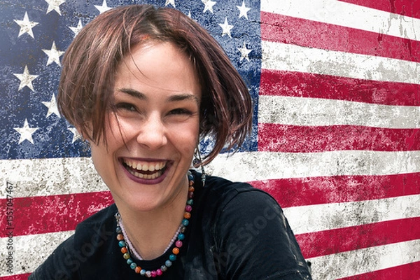 Obraz Happy young woman against the background of the US flag