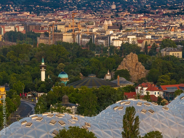 Fototapeta A part of the Budapest Zoo with cityscapes