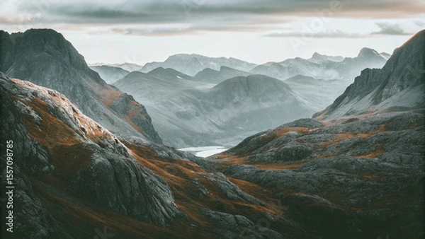Fototapeta Majestic Mountain Range Vista Under a Cloudy Sky