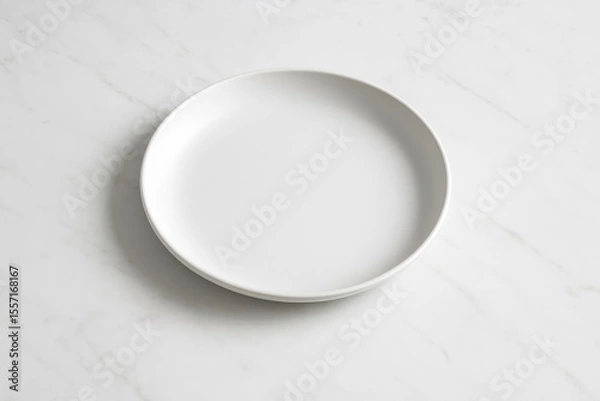 Fototapeta Kitchen table with a round ceramic dish or bowl