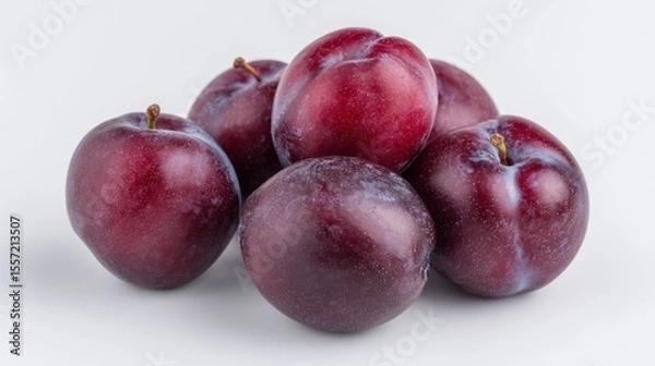 Fototapeta Juicy, velvety mass of ripe plums symbolizes Lammas abundance, infusing European harvest vibes and antioxidant ecstasy