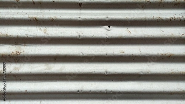 Fototapeta lang="x-default" White corrugated iron sheet metal background forming a construction fence