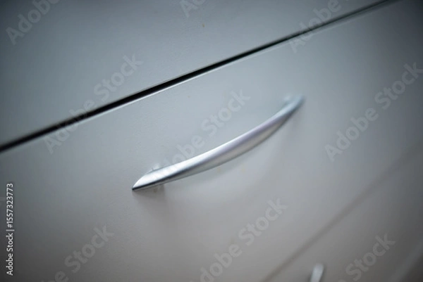 Obraz A CloseUp View of a Modern and Stylish Drawer Handle that Enhances Any Contemporary Design