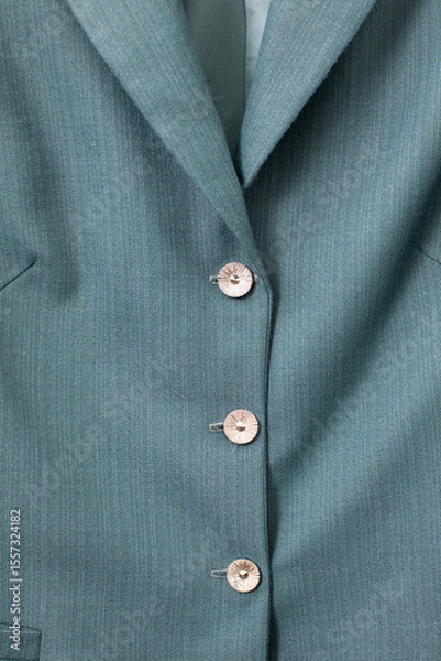 Obraz An Elegant Green Blazer That Showcases Beautiful And Stylish Button Detail Perfectly