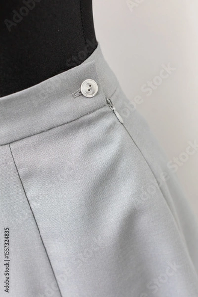 Obraz Discover the Elegant Gray Skirt with beautiful Button Detail, designed for Fashion Lovers