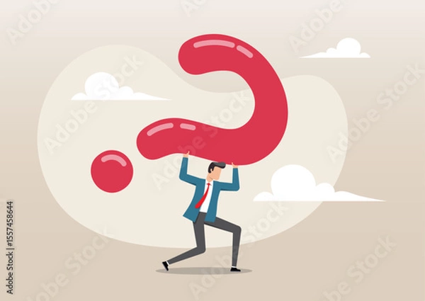 Fototapeta A businessman struggling as he carries an enormous, heavy red question mark 