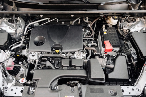 Fototapeta Close-up of new car engine. Car parts concept.