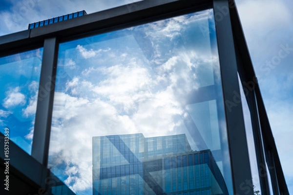Obraz Modern office building reflection on window glass