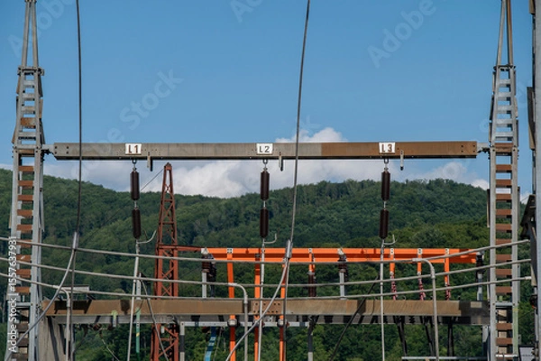 Obraz High voltage switch. High voltage electrical transformer substation. Power station. Power line.