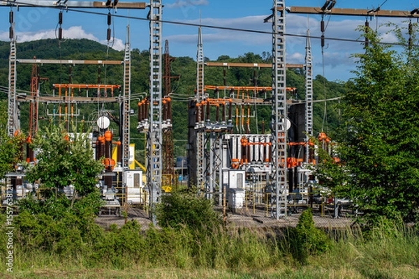 Obraz High voltage switch. High voltage electrical transformer substation. Power station. Power line.