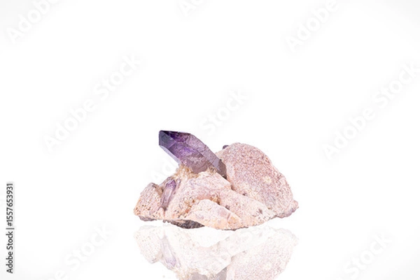 Fototapeta Amethyst crystal. Specimen from Erongo, Namibia. photography isolated on white blackground. macro detail background. close-up mineral crystal unpolished semi-precious gemstone.