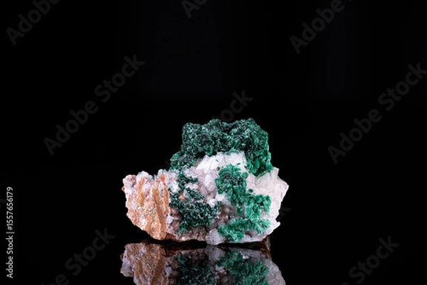 Fototapeta green Malachite on white Calcite. Specimen from Tsumeb mine, Namibia. photography isolated on black background. macro detail close-up mineral crystal unpolished semi-precious gemstone.
