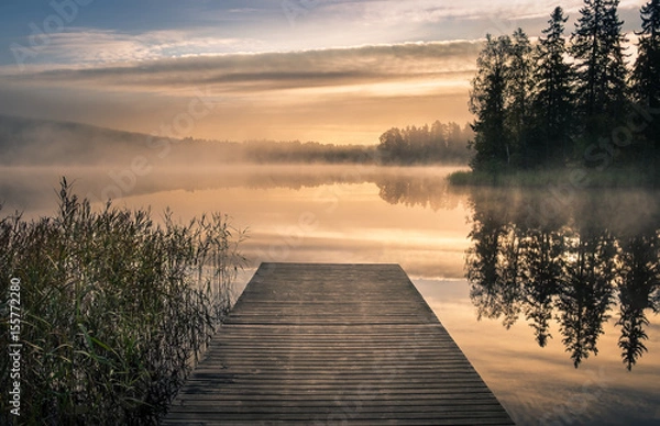 Fototapeta Scenic landscape with morning mood and sunrise at autumn in Finland