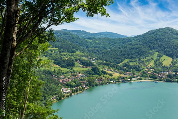 Fototapeta The Drina River and the mountains above it. A magnificent summer landscape. The border of Serbia and Bosnia and Herzegovina.