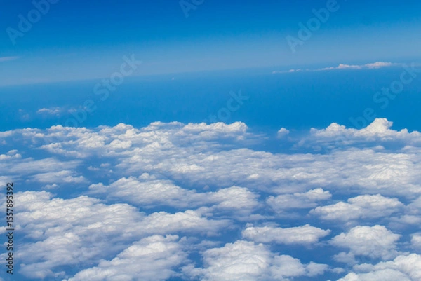 Obraz blue sky with clouds. Blue sky and clouds shot from a very high position.