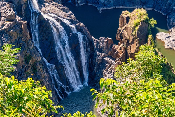 Obraz Located in Barron Gorge National Park near the rainforest village of Kuranda, this mammoth waterfall flows down rocky ledges for 250m