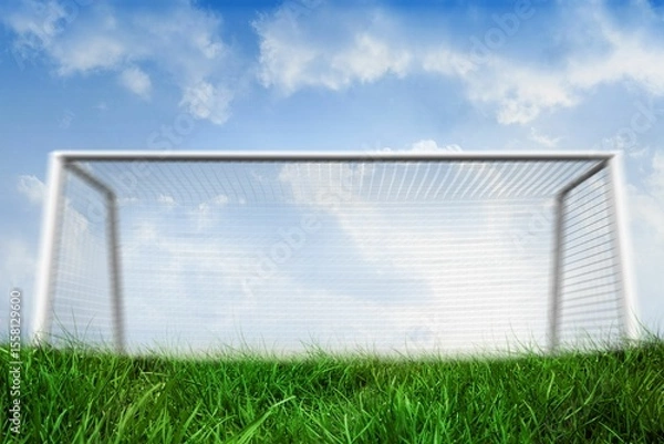 Fototapeta Goalpost on grass under blue sky