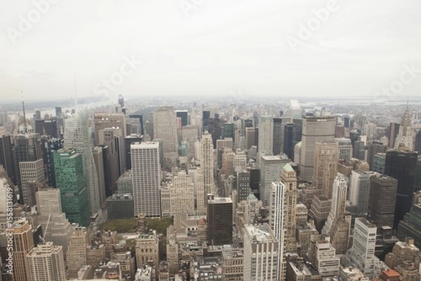 Obraz Cluster of skyscrapers is being shown in vector art, featuring rooftop HVAC units and riverbank