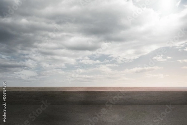 Fototapeta Empty paved surface is stretching toward horizon in flat design, featuring overcast sky, copy space