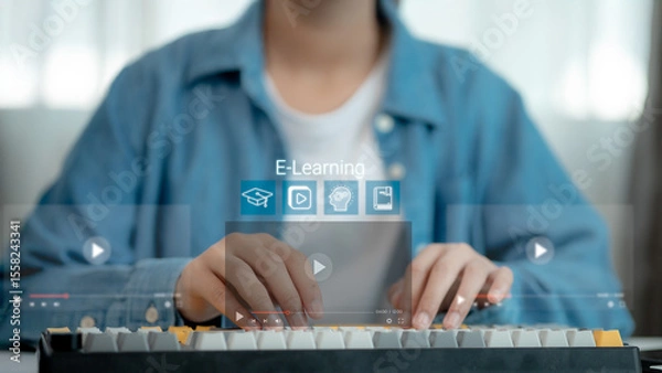 Obraz Close-up of hands typing on keyboard with virtual e-learning interface and online video icons, representing digital education, online training, virtual class, and modern learning technology.