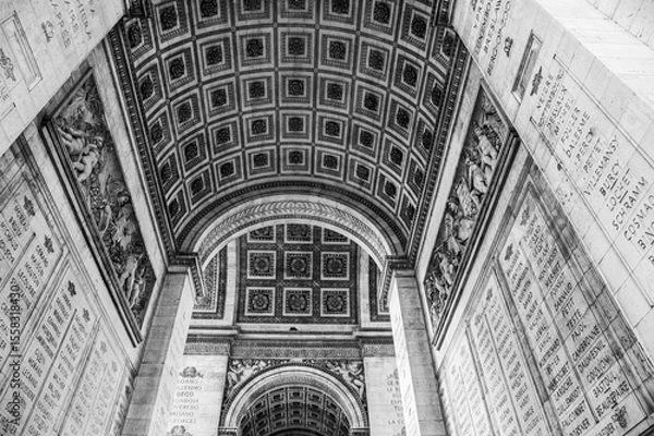 Obraz The Arc de Triomphe in Paris, France. Black and white photo.