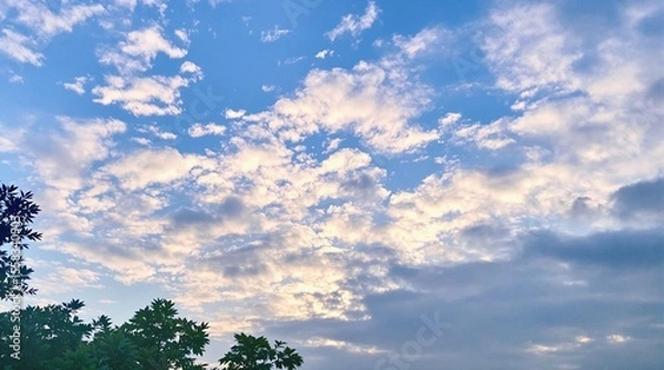 Fototapeta background, sky, blue, light, summer, nature, landscape, sunlight, bright, heaven, abstract, day, weather, sunny, white, climate, environment, fluffy, horizon, cloudy, air, sun, clear, pattern, spring